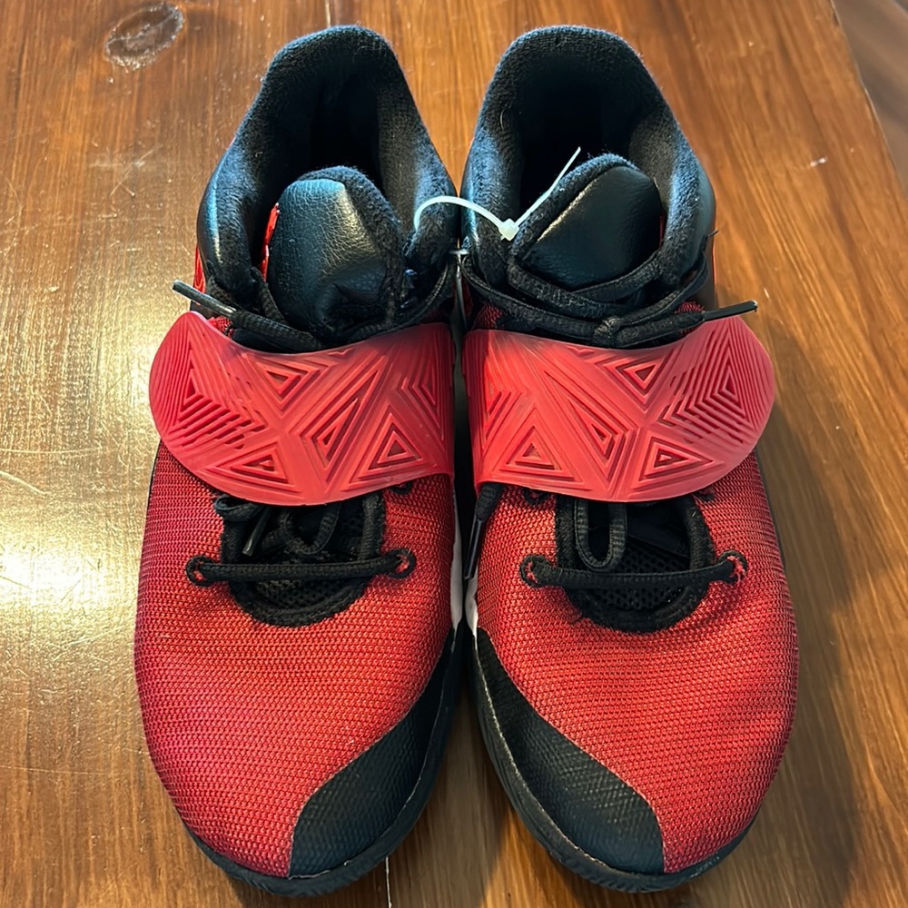 Sz 7Y Kyrie Irving red/blk basketball shoes. Some wear but still lots of life!